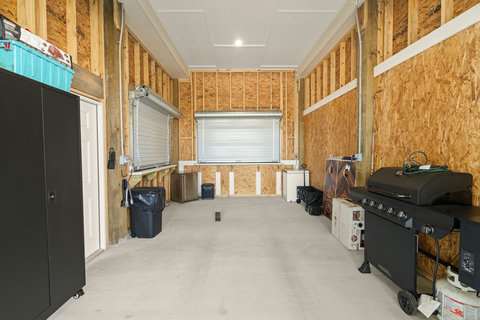 Garage with a grill and storage