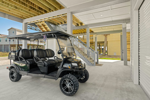 Six-seat golf cart for trips to the beach (fee applies)