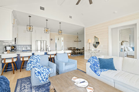 Living area open to the kitchen bar