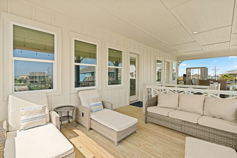 Wicker lounge seating on the deck