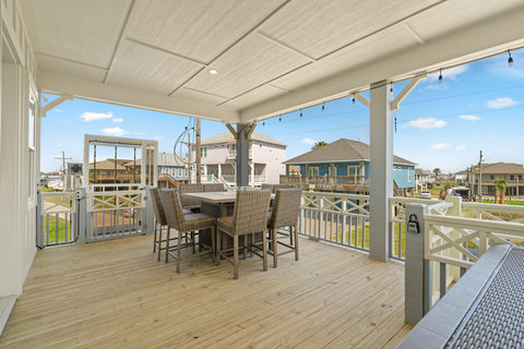 High-top table on the covered deck