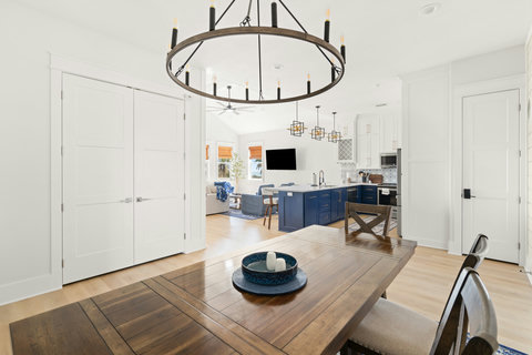 Dining table with the living room beyond