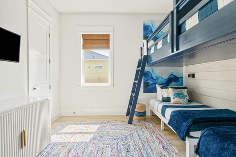 Bunk room with a TV for the kids