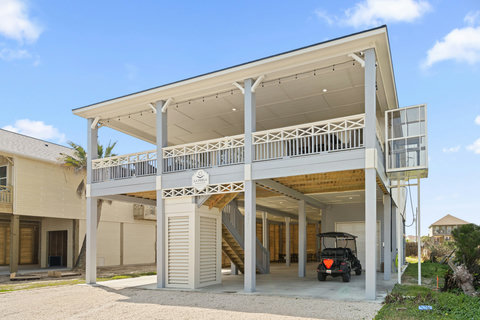 Covered deck on the upper level, shaded patio below