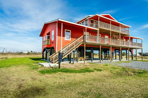 The triplex and its wide yard
