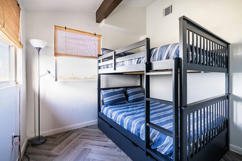 Bunk room with a full-over-full bunk and trundle