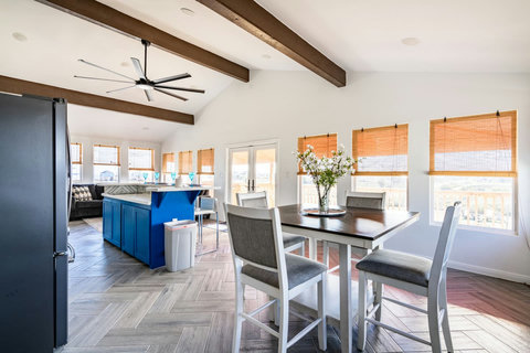 Dining table next to the kitchen island