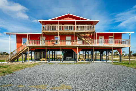 Covered decks on two levels and a big shaded patio