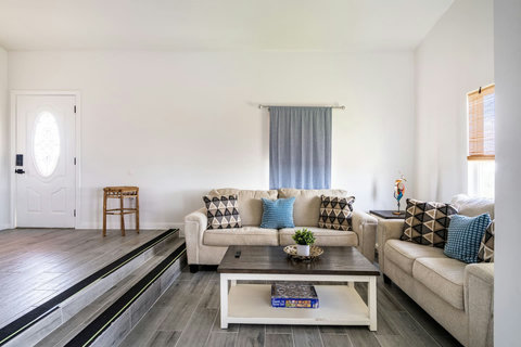 Sunken living room with comfy sofas
