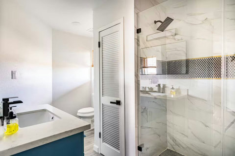 Bath with a glass shower