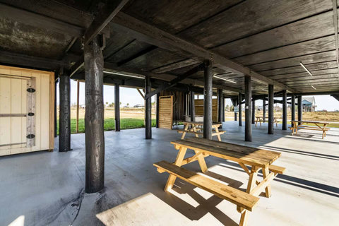 Picnic tables under the house
