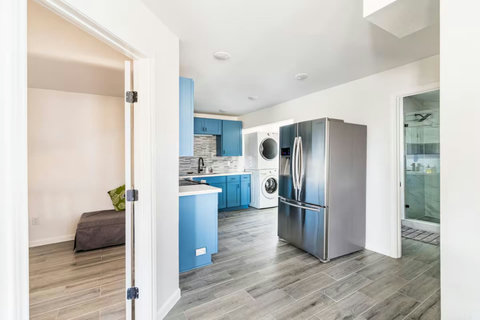 Kitchen with stacked laundry