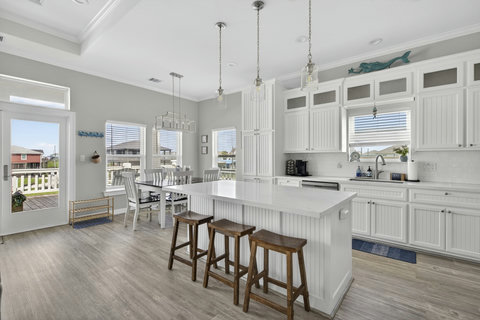 Breakfast bar with the dining table beyond