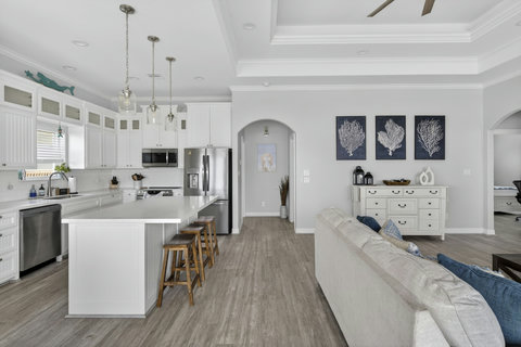 Bar stools at the long kitchen island