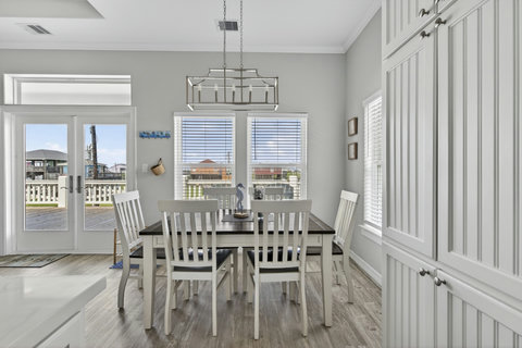Dining for six by the deck doors