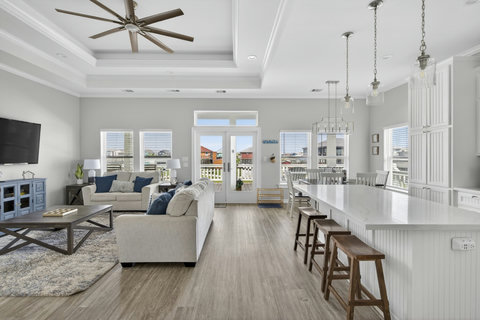 Living room flows into the kitchen bar