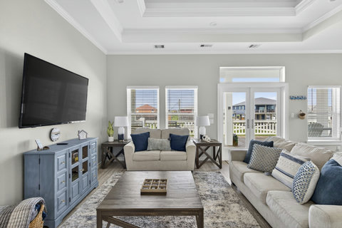 Comfy sofas, a smart TV and plenty of light