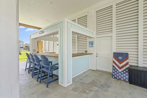 Downstairs tiki bar with seating for four