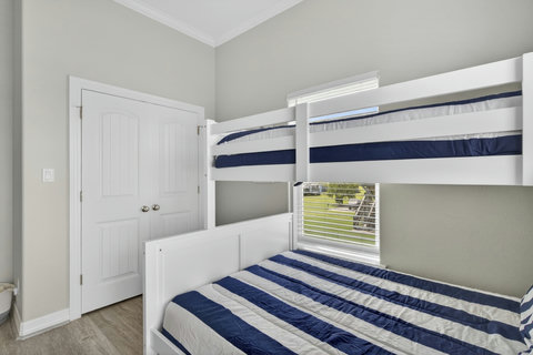 Bunk room with a double closet