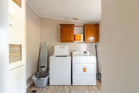 Laundry room with washer and dryer