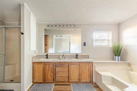 Primary bath with a soaking tub and double vanity