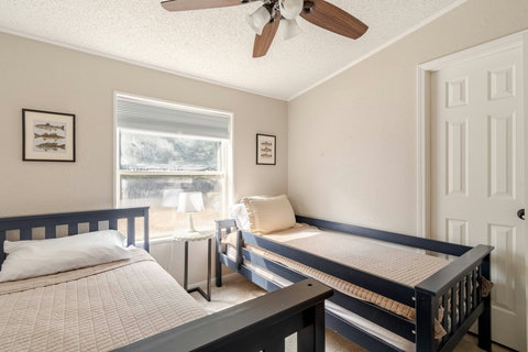 Two twin beds with fish prints