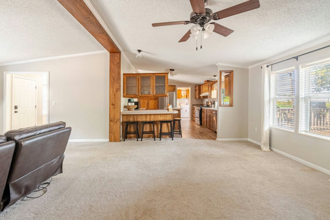 Living room open to the kitchen