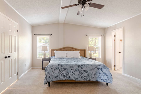 King bed with a padded headboard