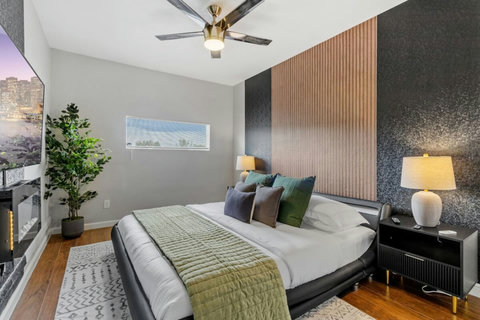 Bedroom with wood slat accent wall