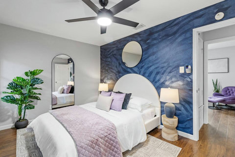 Bedroom with an arched mirror