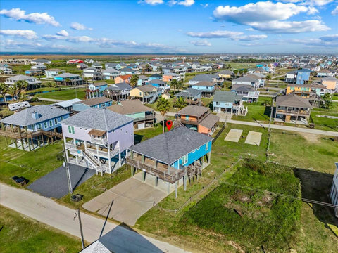 Aerial view of the house and neighborhood