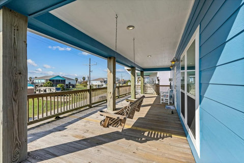 Porch swing on the covered deck