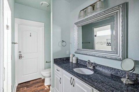 Bath with a granite vanity