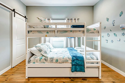 Bunk room with a full-over-full bunk and trundle