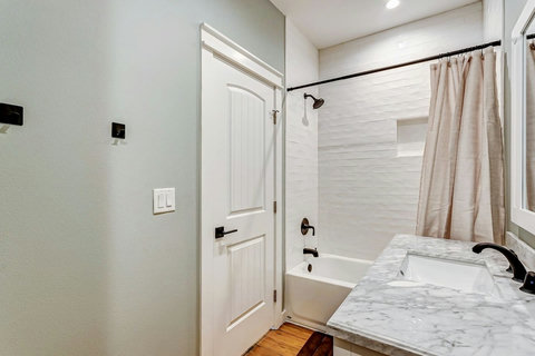 Bath with a tub-shower