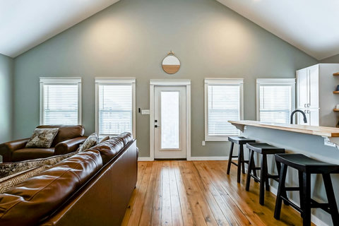 Living room with a smart TV and French door