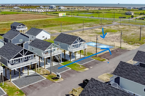 The pool and pickleball court from above