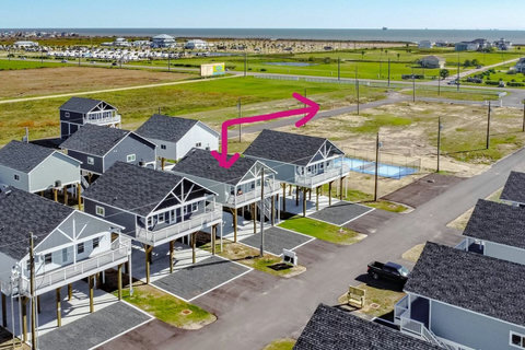 Aerial view of the cottages and pool