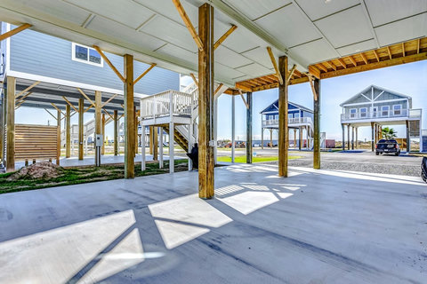 Covered parking under the cottage