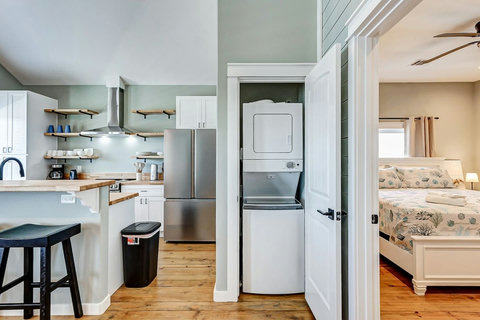 Kitchen with a stacked washer and dryer