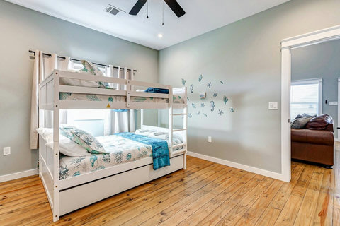 Bunk room with a view of the living room