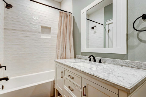 Hall bath with a tub-shower