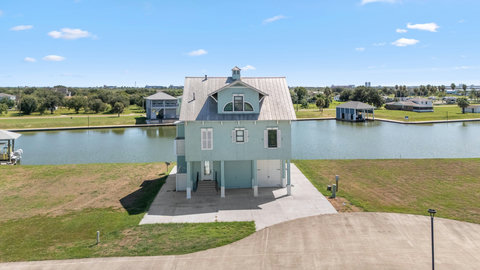 The house from above with the canal behind it