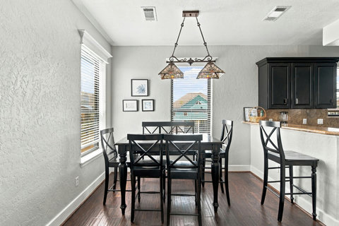 Dining area with a stained-glass light