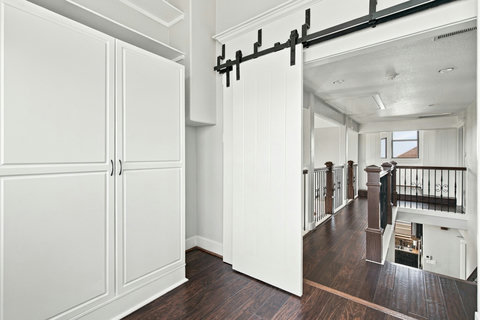 Barn doors close off the sleeping area