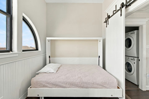Murphy bed next to the laundry closet