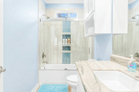 Hall bath with a tub-shower combo