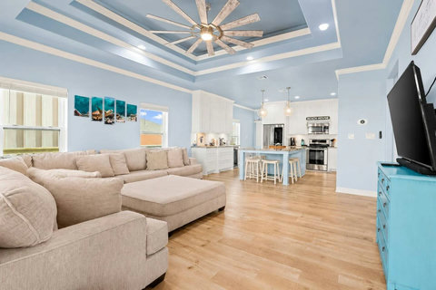Living room open to the kitchen and dining area
