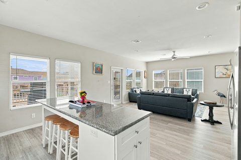 Kitchen island with the living room beyond