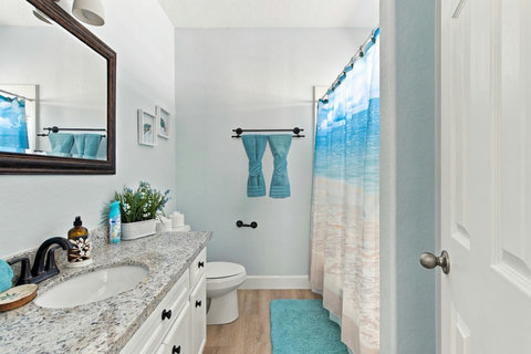 Primary bath with a tub-shower
